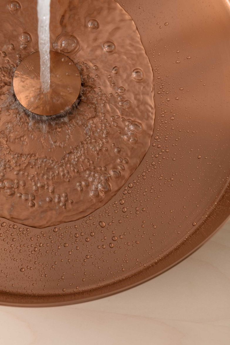 Die kreisförmigen Edelstahlbecken vereinen puristisches Design mit praktischer Funktionalität.